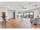 Bonus room with water views, hardwood floors, and a ceiling fan at 3167 Whisper Wind Dr, St Cloud, FL 34771