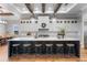 Large kitchen island with seating and white cabinets at 3167 Whisper Wind Dr, St Cloud, FL 34771