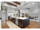 Open concept kitchen features a large island and stainless steel appliances at 3167 Whisper Wind Dr, St Cloud, FL 34771