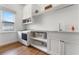 Bright laundry room with washer, dryer, and ample counter space at 3167 Whisper Wind Dr, St Cloud, FL 34771