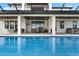 Relaxing pool area with covered patio and spa at 3167 Whisper Wind Dr, St Cloud, FL 34771