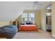 Bedroom with twin bed, beanbag chair, and ensuite bathroom at 3305 Cat Brier Trl, Harmony, FL 34773