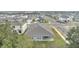 Aerial view of a house with gray roof and a patio, located in a suburban neighborhood at 348 Conway Avenue, Saint Cloud, FL 34771