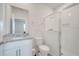 Clean bathroom with granite countertop and walk-in shower at 348 Conway Avenue, Saint Cloud, FL 34771