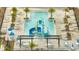 Community pool with waterslide and surrounding lounge chairs at 348 Conway Avenue, Saint Cloud, FL 34771