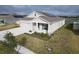 One story house with solar panels, view of the lake at 420 Watusi Way, St Cloud, FL 34772