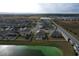 Aerial view of homes near lake in a residential area at 420 Watusi Way, St Cloud, FL 34772