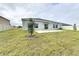 Spacious backyard with patio and grassy area at 420 Watusi Way, St Cloud, FL 34772