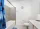Bathroom with tub, shower, and white vanity at 420 Watusi Way, St Cloud, FL 34772