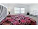 Bright bedroom with lake view and modern decor at 420 Watusi Way, St Cloud, FL 34772