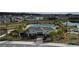 Community pool with cabana and surrounding landscape at 420 Watusi Way, St Cloud, FL 34772
