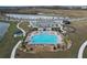 Community pool with lounge chairs and cabana at 420 Watusi Way, St Cloud, FL 34772