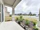 Inviting front porch with view of neighborhood at 420 Watusi Way, St Cloud, FL 34772