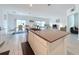 Modern kitchen with island and stainless steel appliances at 420 Watusi Way, St Cloud, FL 34772