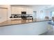 Modern kitchen with stainless steel appliances and island at 420 Watusi Way, St Cloud, FL 34772