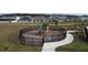 Community playground with playset and fence at 420 Watusi Way, St Cloud, FL 34772