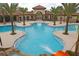 Resort-style community pool with water features and a slide at 4735 Terrasonesta Dr, Davenport, FL 33837