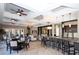 Spacious community room with comfortable seating and bar at 4735 Terrasonesta Dr, Davenport, FL 33837