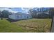 Spacious backyard with a large grassy area at 605 Raven Ct, Kissimmee, FL 34759