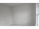 Spacious bedroom with large window and marble-look floors at 605 Raven Ct, Kissimmee, FL 34759