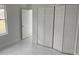 Bedroom with double doors and large closet at 605 Raven Ct, Kissimmee, FL 34759