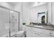 Clean bathroom with a walk-in shower and modern vanity at 6091 High Seas Dr, Orlando, FL 32821