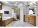 Bathroom with soaking tub and walk-in shower at 673 Copeland Dr, Haines City, FL 33844