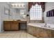 Bathroom features a soaking tub and double vanity at 673 Copeland Dr, Haines City, FL 33844