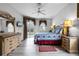 Main bedroom with a king-size bed and pool view at 673 Copeland Dr, Haines City, FL 33844