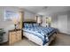 Bedroom with a king-size bed and plenty of natural light at 673 Copeland Dr, Haines City, FL 33844