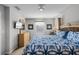 Main bedroom with a king-size bed and attached bathroom at 673 Copeland Dr, Haines City, FL 33844