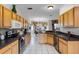 Spacious kitchen features ample cabinetry and modern appliances at 673 Copeland Dr, Haines City, FL 33844
