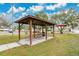 Community picnic pavilion with tables and grills at 723 Florida Pkwy, Kissimmee, FL 34743
