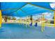 Community playground with shaded swings at 723 Florida Pkwy, Kissimmee, FL 34743