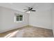 Bright bedroom with tile flooring and ceiling fan at 812 Kentucky Woods E Ln, Orlando, FL 32824