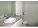 Bathroom with single vanity and tub at 1366 Yellow Finch Dr, Davenport, FL 33837