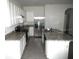 Modern kitchen with stainless steel appliances and granite countertops at 1366 Yellow Finch Dr, Davenport, FL 33837