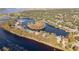 Aerial view of lakefront homes and community at 1465 Riviera Dr, Kissimmee, FL 34744