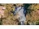 Top-down view of home with grey roof and landscaping at 1465 Riviera Dr, Kissimmee, FL 34744