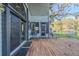 Wooden back deck with grilling area and water views at 1465 Riviera Dr, Kissimmee, FL 34744