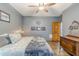 Bedroom with a queen-size bed and dresser at 1465 Riviera Dr, Kissimmee, FL 34744