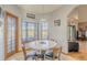 Bright breakfast nook with water views and round table at 1465 Riviera Dr, Kissimmee, FL 34744