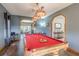 Game room features a pool table and access to the dining room at 1465 Riviera Dr, Kissimmee, FL 34744