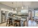Spacious kitchen with stainless steel appliances, granite countertops, and an island at 1465 Riviera Dr, Kissimmee, FL 34744