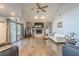 Spacious living room with high ceiling, fireplace, and large windows at 1465 Riviera Dr, Kissimmee, FL 34744