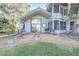 Relaxing patio with fire pit and seating area at 1465 Riviera Dr, Kissimmee, FL 34744