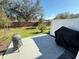 Private backyard with patio and grill at 1861 Roosevelt Pl, St Cloud, FL 34769