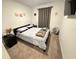 Spacious bedroom with a queen-size bed and ample closet space at 1861 Roosevelt Pl, St Cloud, FL 34769