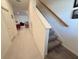Bright entryway with tile flooring and stairs leading upstairs at 1861 Roosevelt Pl, St Cloud, FL 34769