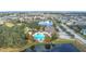 Community pool, clubhouse, playground, and serene lake views at 1940 Banner Ln, St Cloud, FL 34769